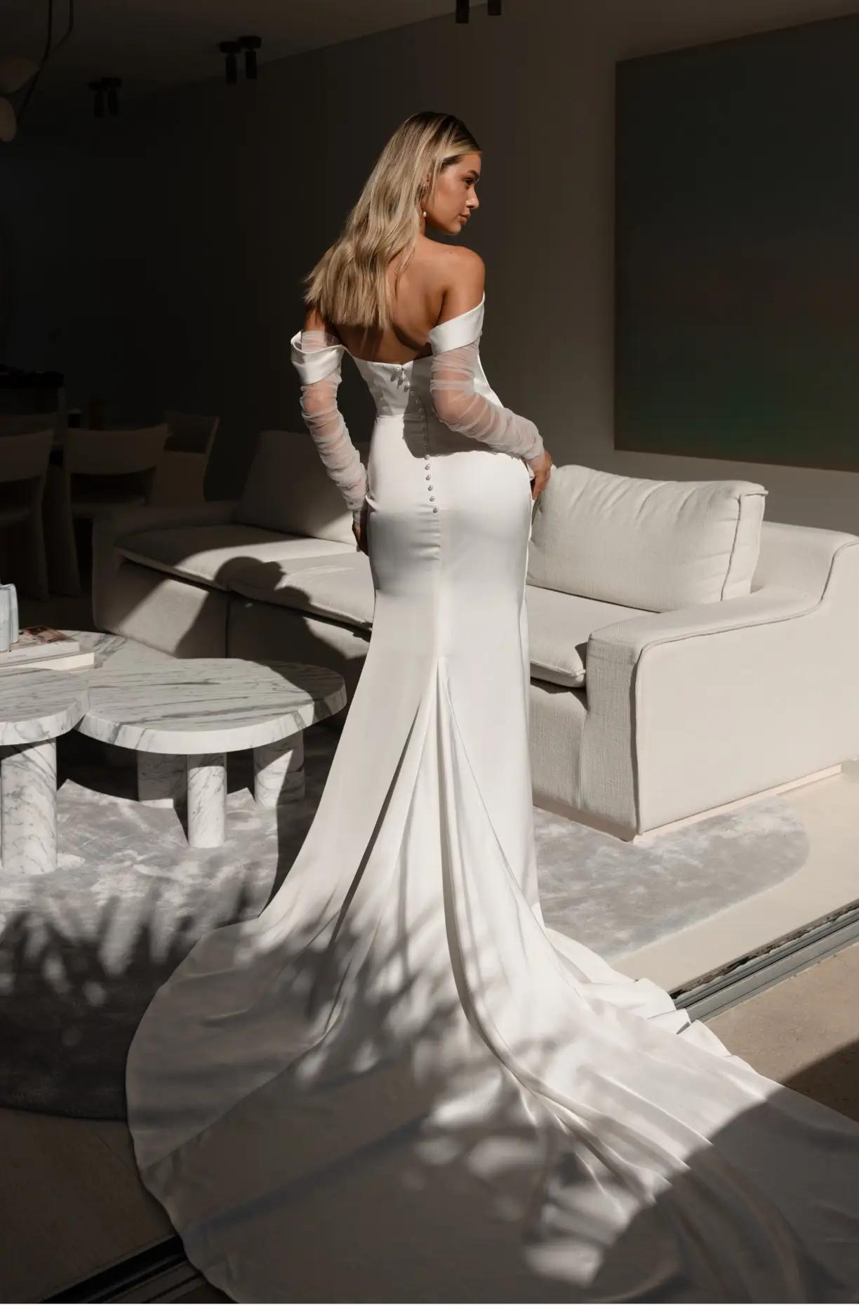Photo of the bride with a white gown